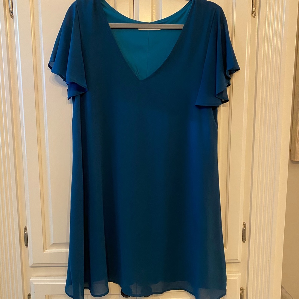 Blue dress with flowy sleeves